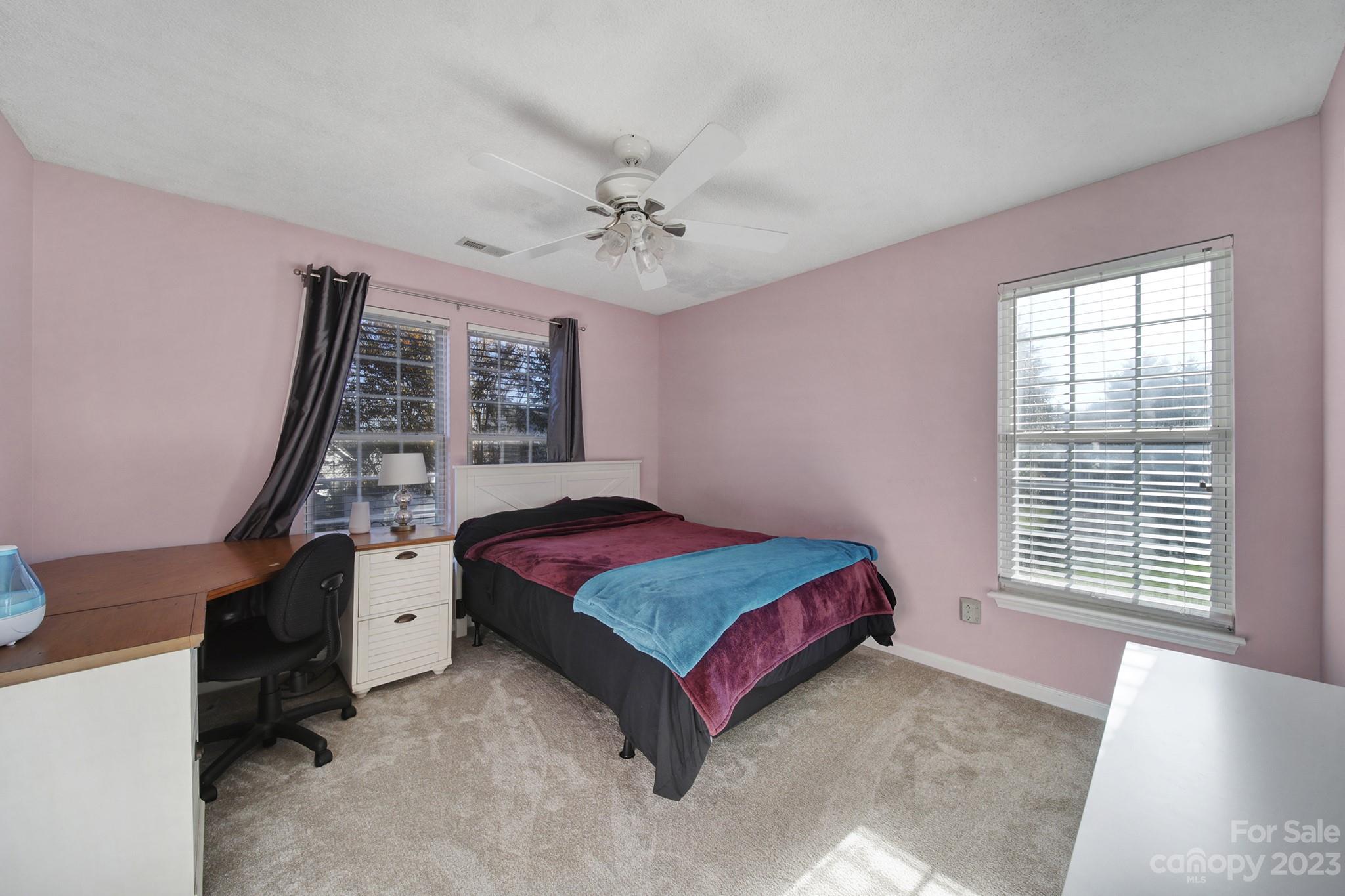 524 Whitehead Court Fort Mill, SC 29708 - Photo 29 of 45 a bedroom with a bed and a large window