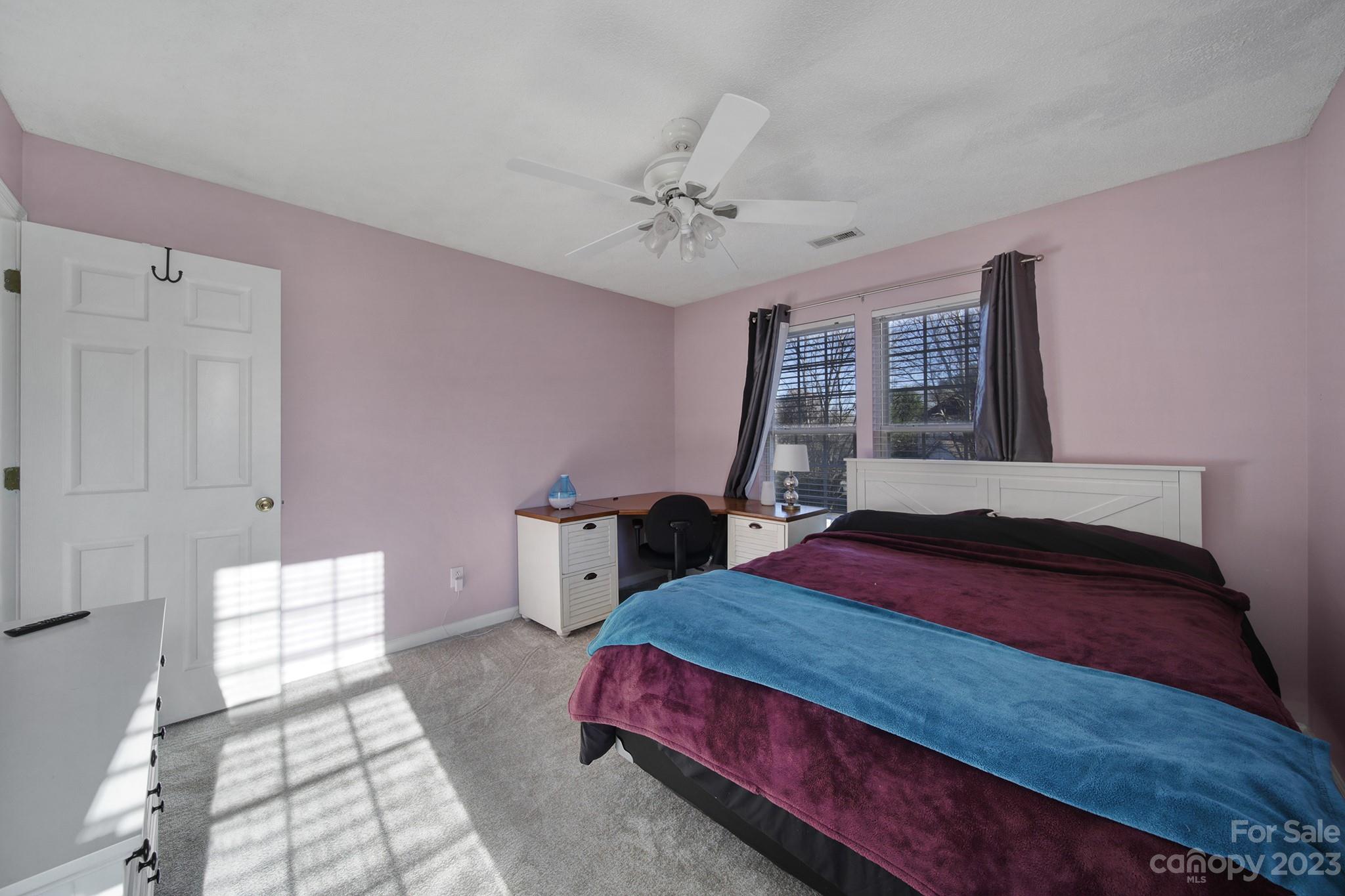 524 Whitehead Court Fort Mill, SC 29708 - Photo 30 of 45 a bedroom with bed and window