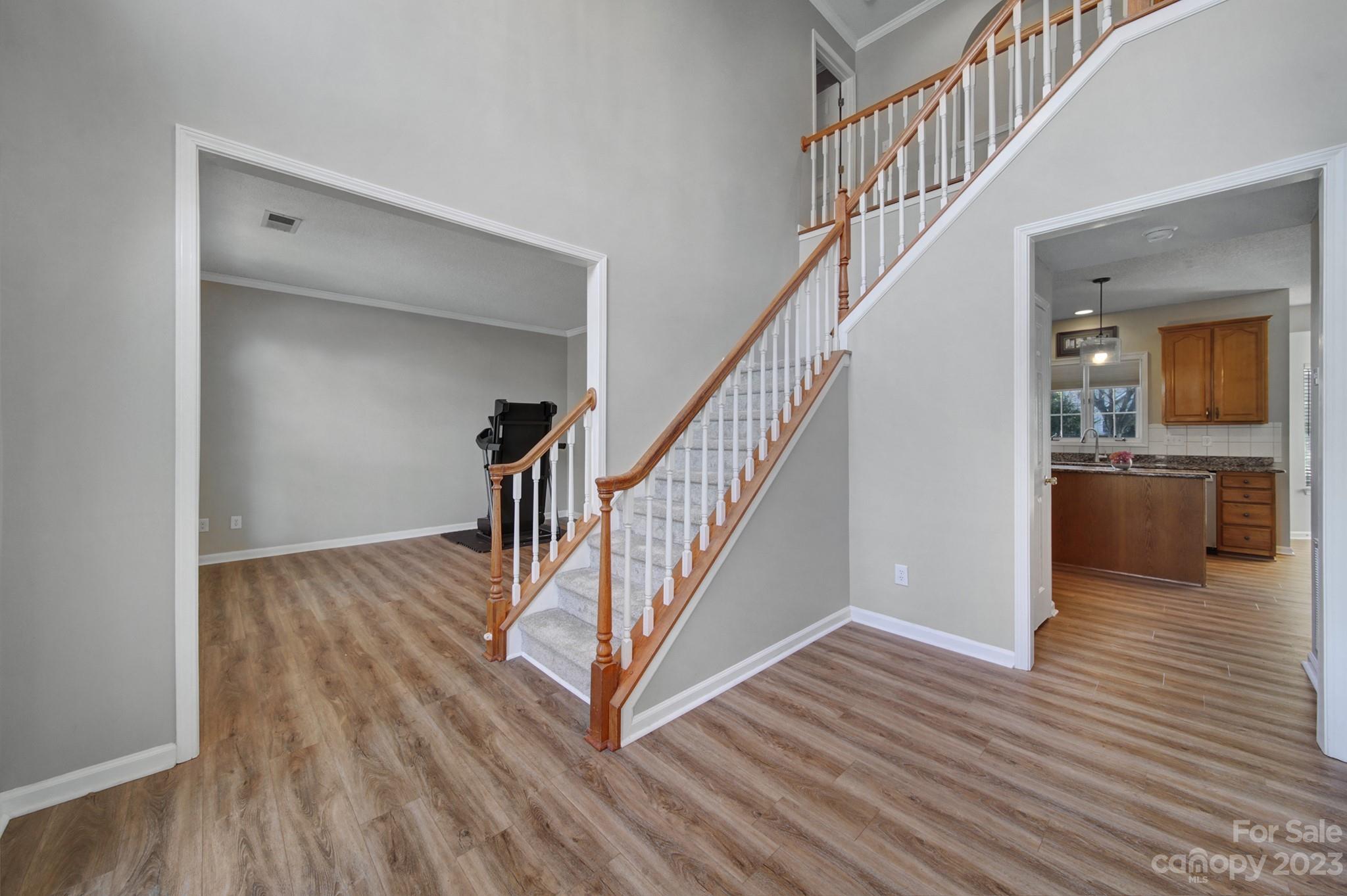 524 Whitehead Court Fort Mill, SC 29708 - Photo 3 of 45 a view of entryway and hall with wooden floor