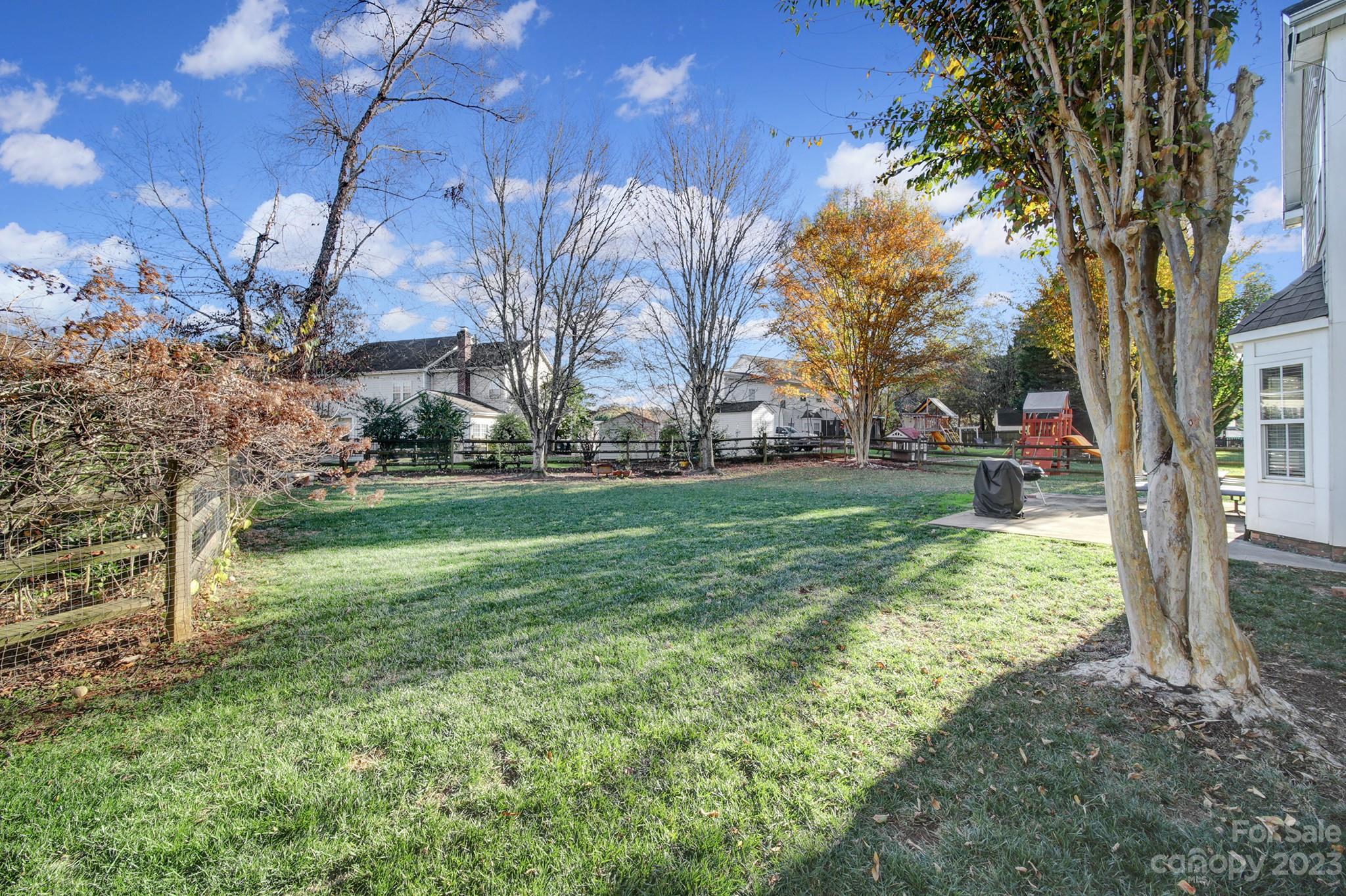524 Whitehead Court Fort Mill, SC 29708 - Photo 34 of 45 a view of a yard with a tree