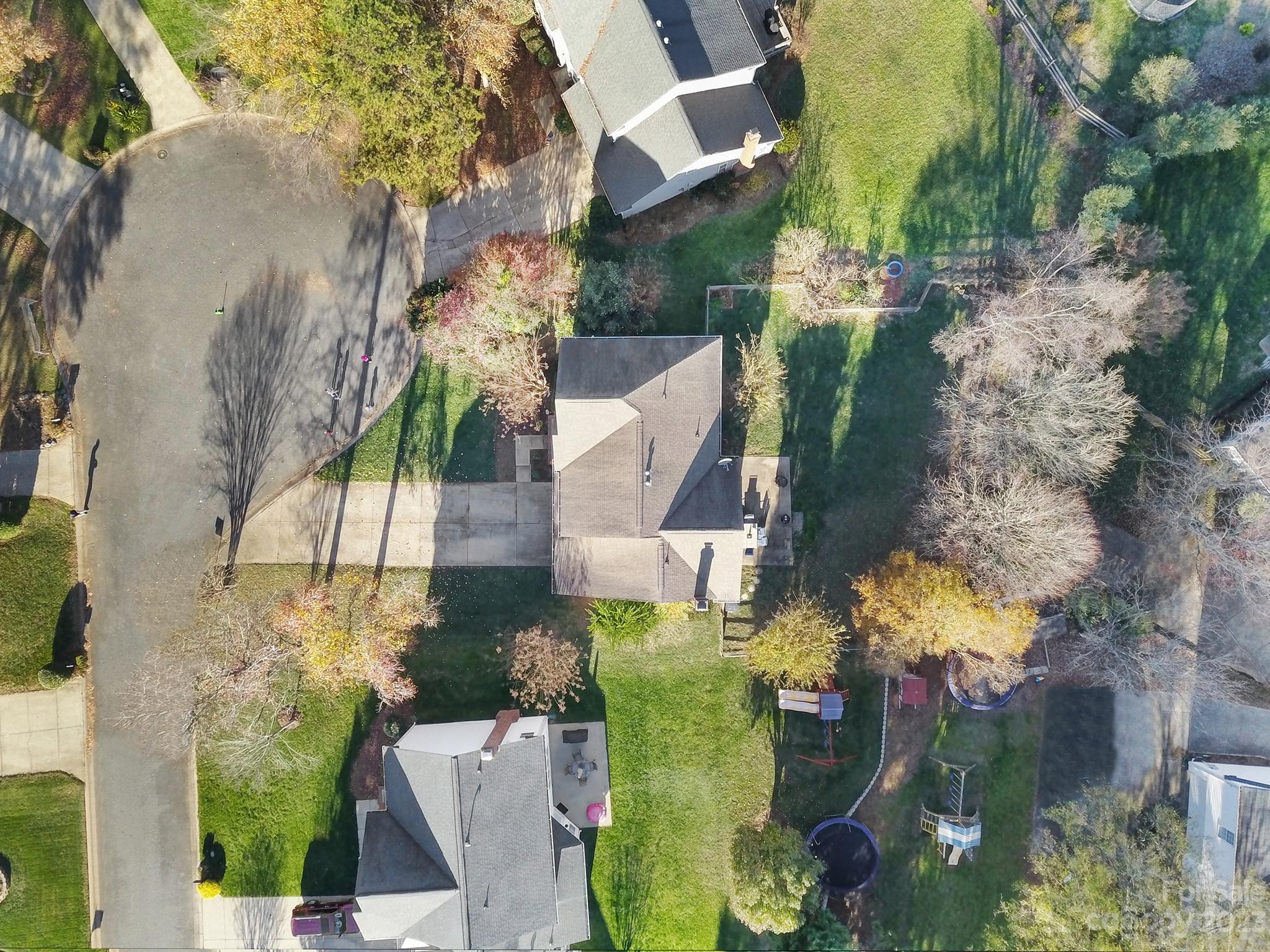 524 Whitehead Court Fort Mill, SC 29708 - Photo 37 of 45 an aerial view of a house with a yard swimming pool and outdoor seating