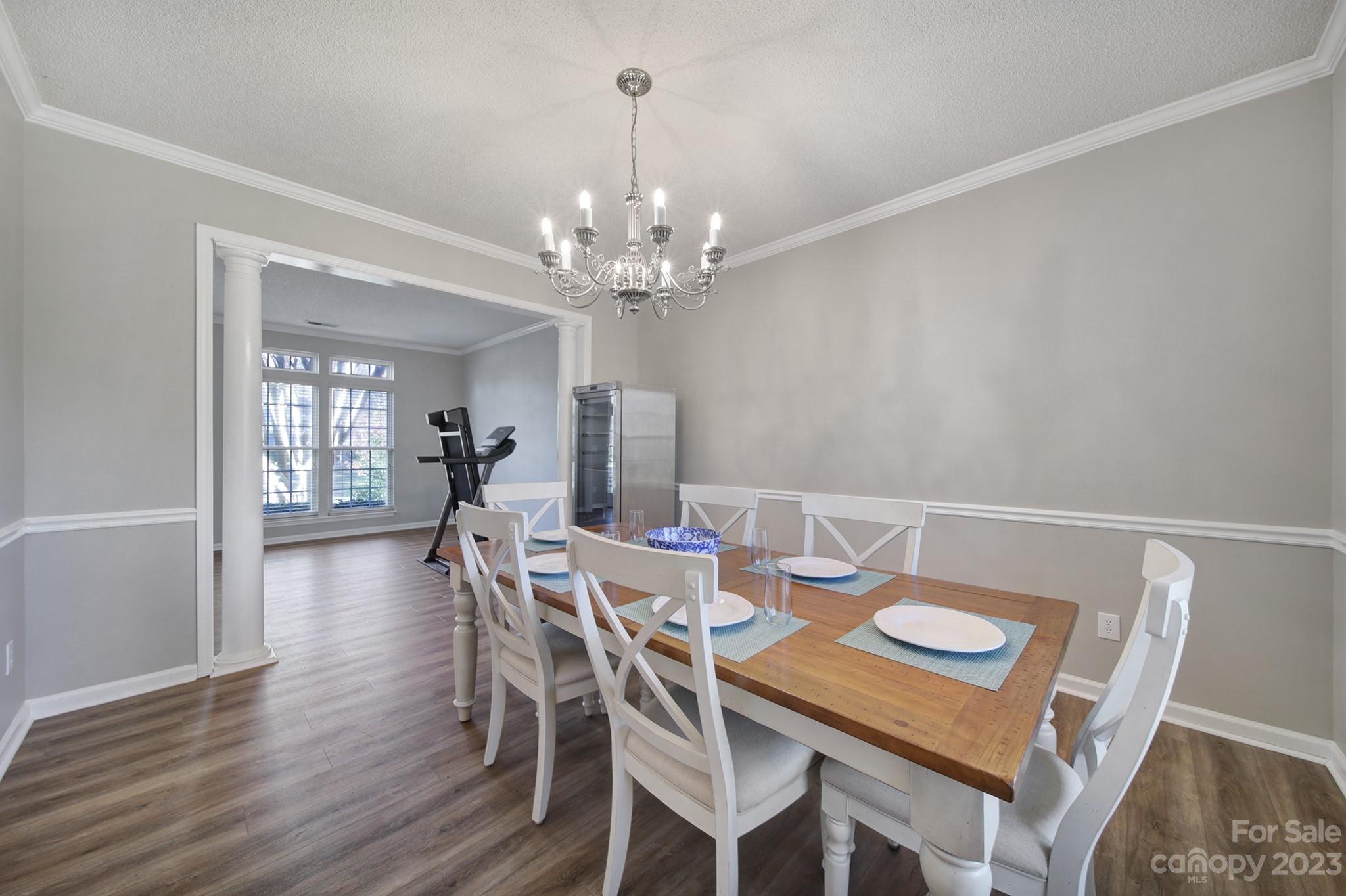 524 Whitehead Court Fort Mill, SC 29708 - Photo 6 of 45 a view of a dining room with furniture and wooden floor