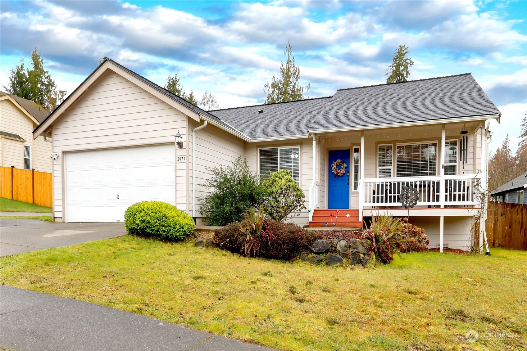 2977 Lowren Loop Port Orchard, WA 98366 - Photo 1 of 33 a front view of house with yard