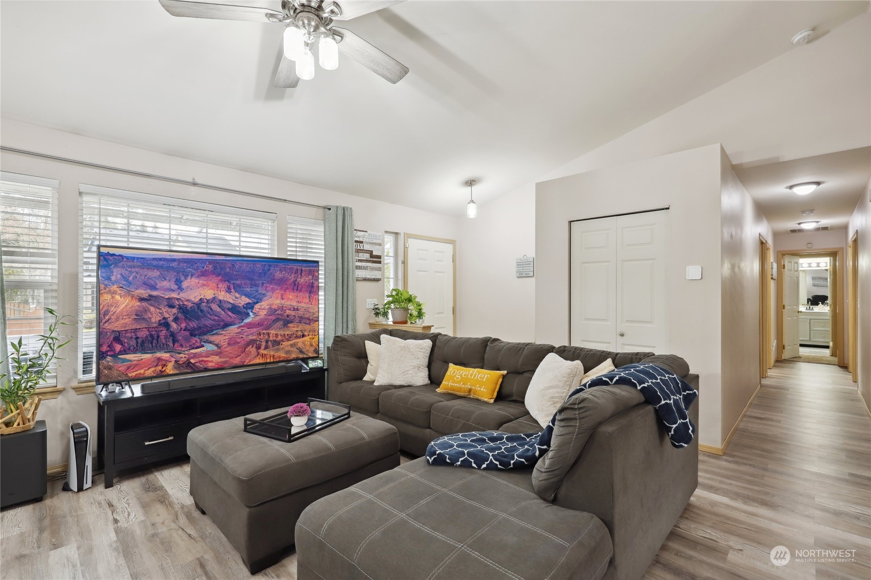 2977 Lowren Loop Port Orchard, WA 98366 - Photo 18 of 33 a living room with furniture and a flat screen tv