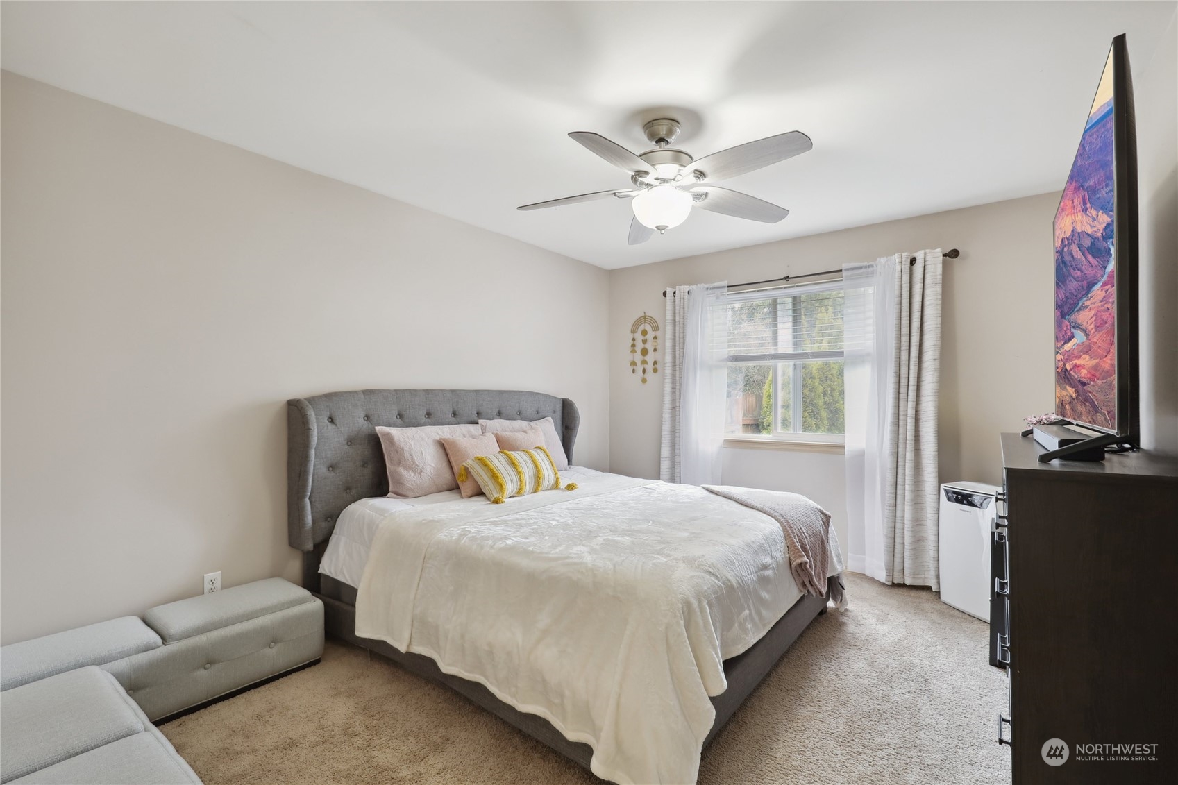 2977 Lowren Loop Port Orchard, WA 98366 - Photo 19 of 33 a bedroom with a bed furniture and a window