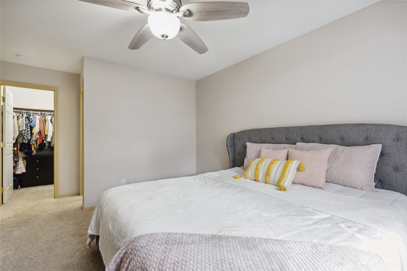 2977 Lowren Loop Port Orchard, WA 98366 - Photo 20 of 33 a bedroom with a bed and ceiling fan