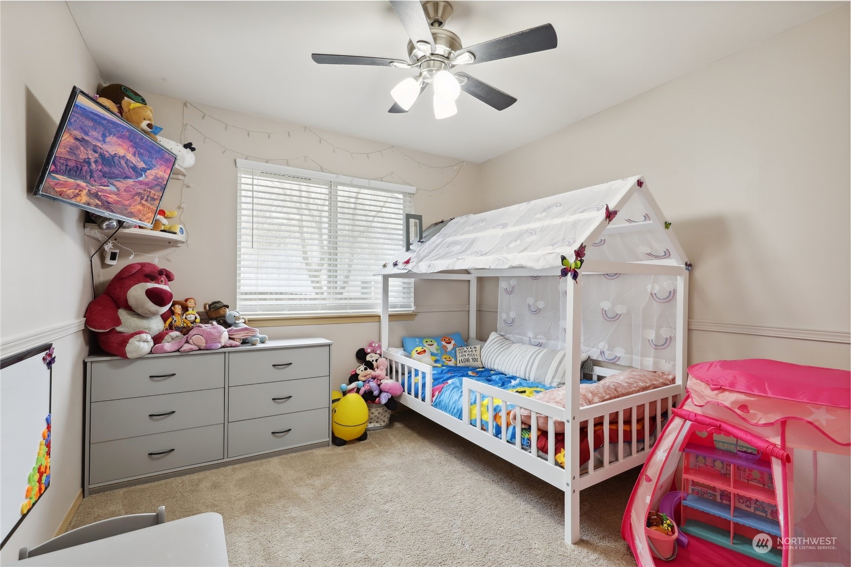 2977 Lowren Loop Port Orchard, WA 98366 - Photo 23 of 33 a bedroom with a bed and a baby crib