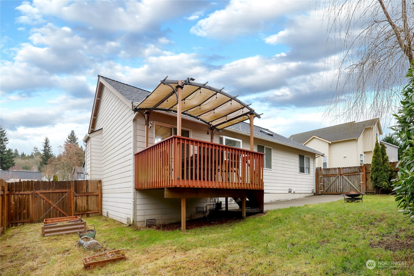 2977 Lowren Loop Port Orchard, WA 98366 - Photo 29 of 33 a view of a house with a yard