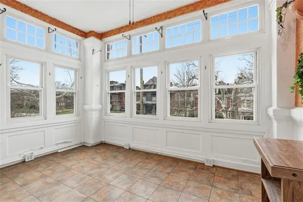 an empty room with windows