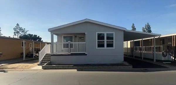 a house with trees in front of it