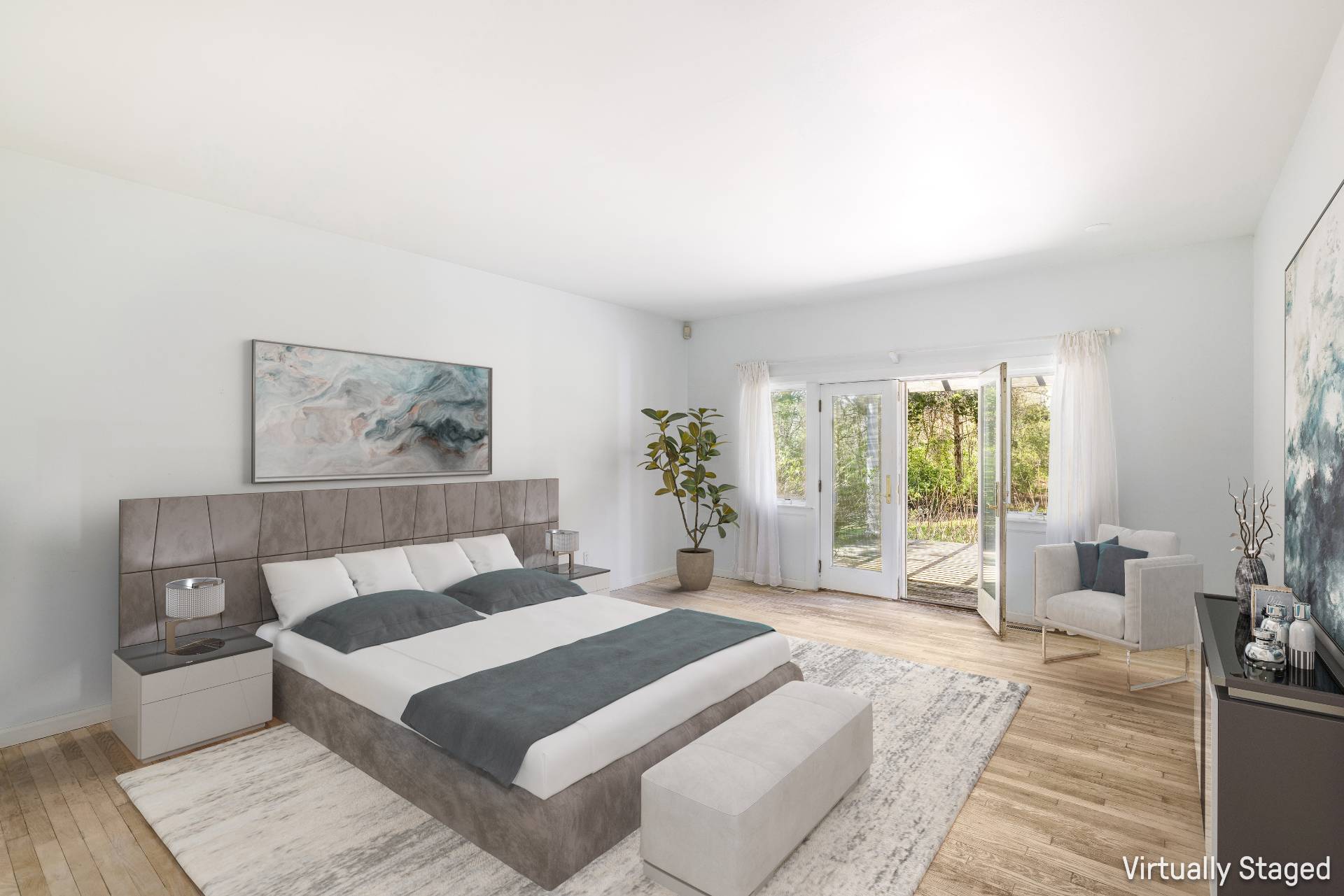 23 Fieldview Lane East Hampton, NY 11937 - Photo 9 of 16 a bedroom with a large bed and a couch