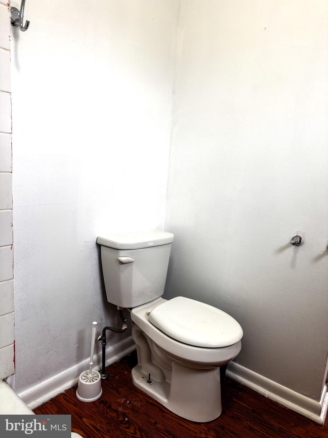 234 Windsor Avenue Upper Darby, PA 19082 - Photo 13 of 28 a bathroom with a toilet and a sink