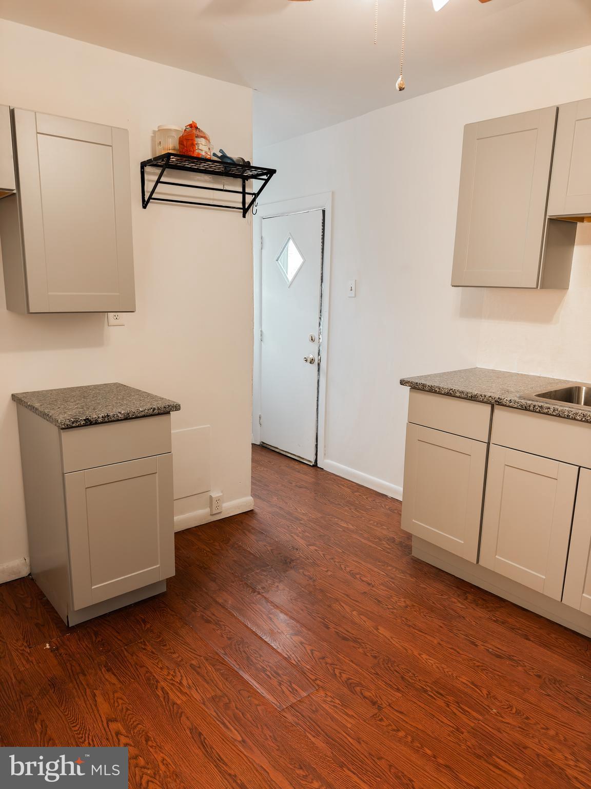 234 Windsor Avenue Upper Darby, PA 19082 - Photo 9 of 28 a view of cabinets and wooden floor