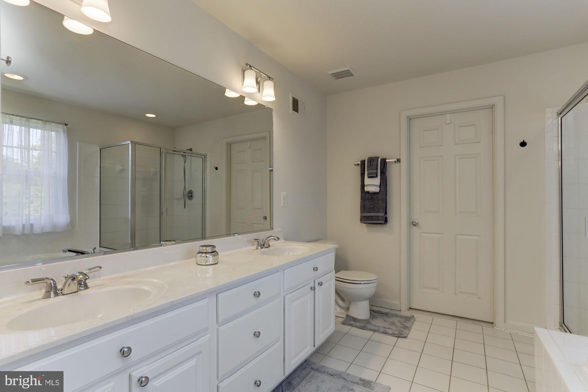 10689 Stansfield Road Laurel, MD 20723 - Photo 22 of 52 Primary bath with double sinks