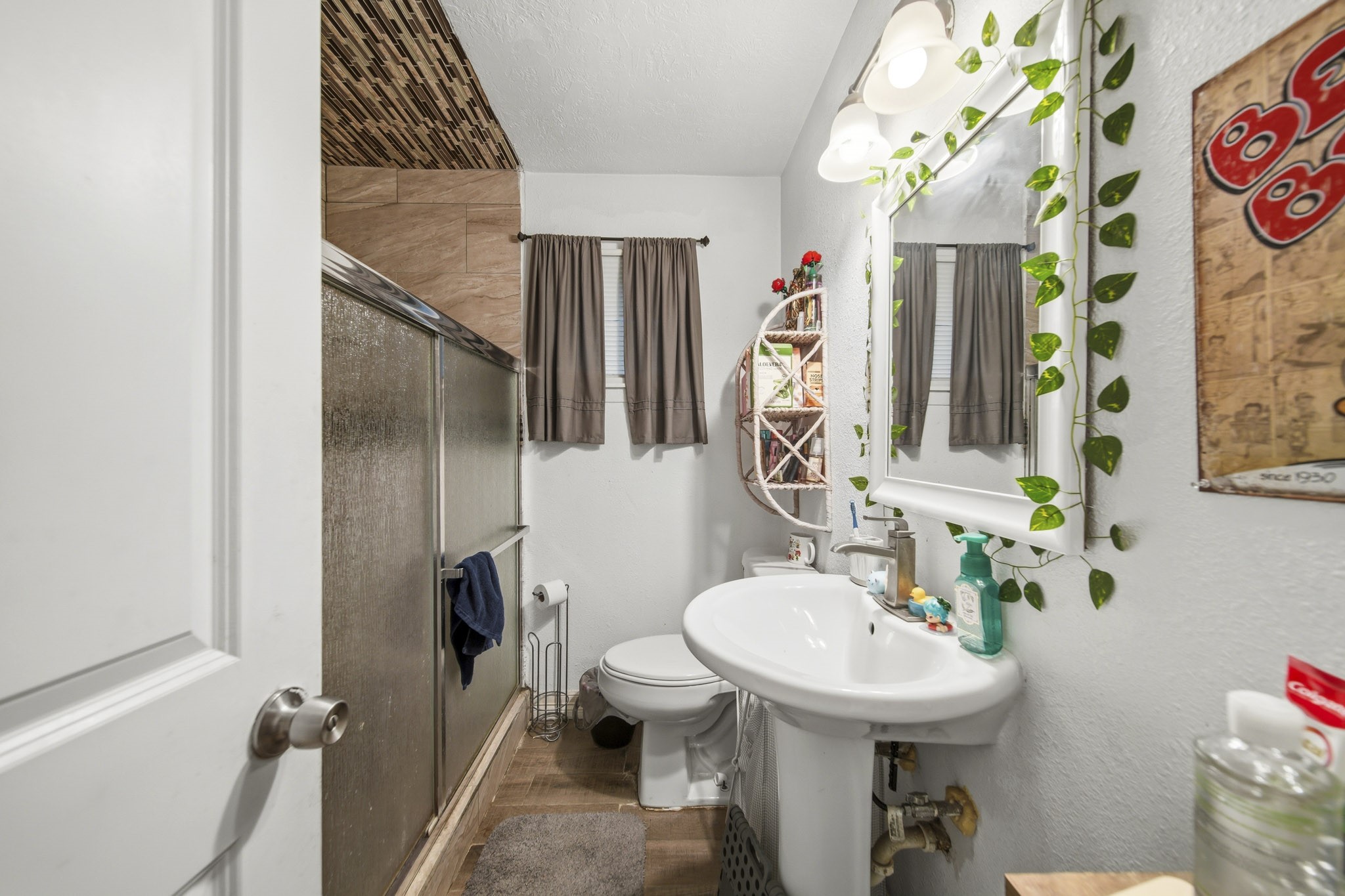 731 Meneley Road Winnie, TX 77665 - Photo 22 of 27 a bathroom with a sink toilet and shower
