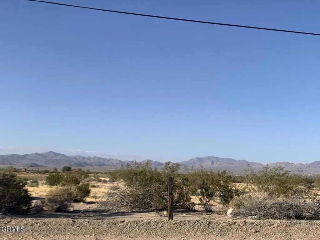0 Rabbit Springs Lucerne Valley, CA 92356 - Photo 5 of 11 a view of a city with mountain