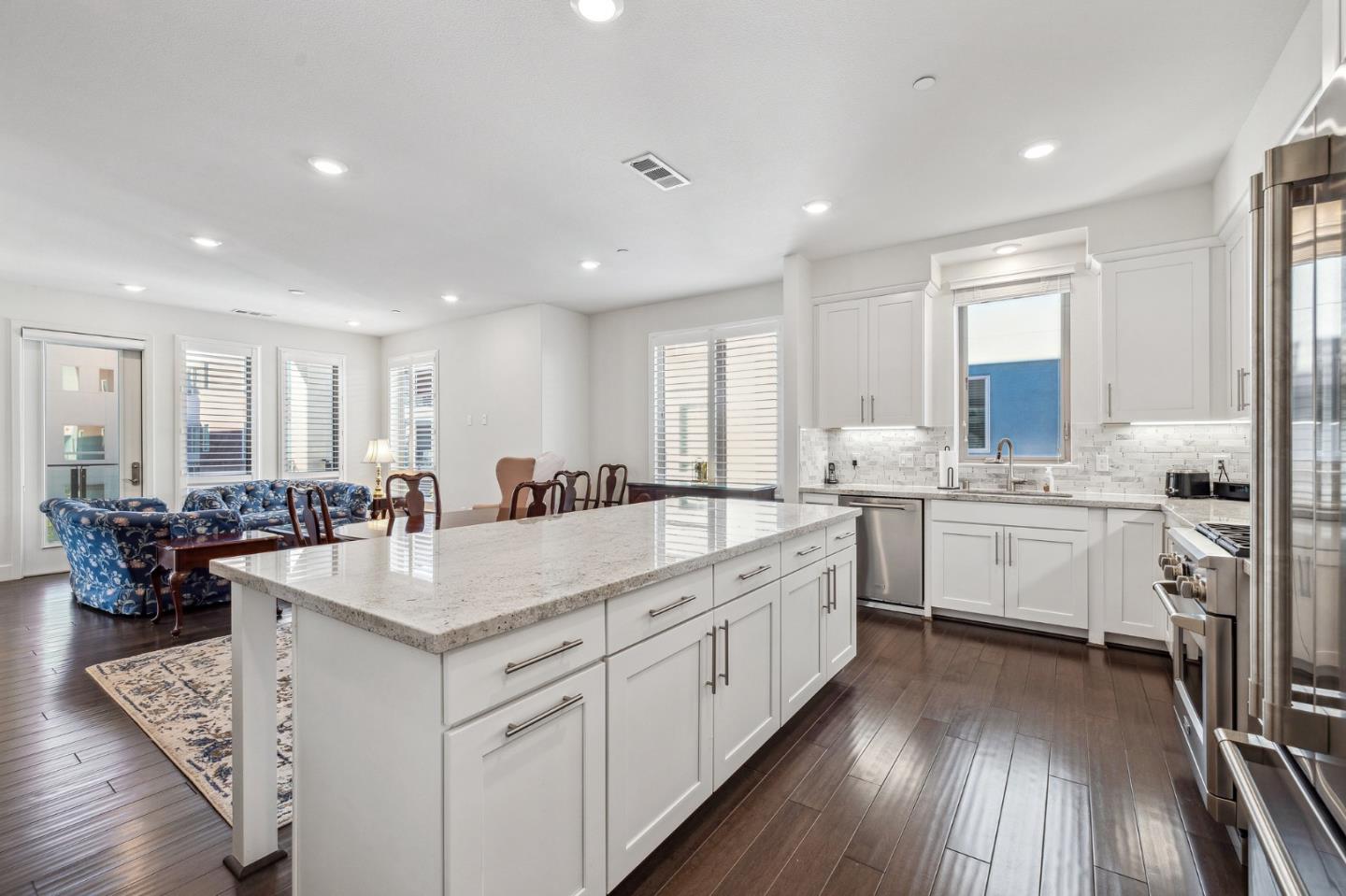 779 Eppleton Lane, Unit 304 Foster City, CA 94404 - Photo 12 of 34 a large white kitchen with a lot of counter space