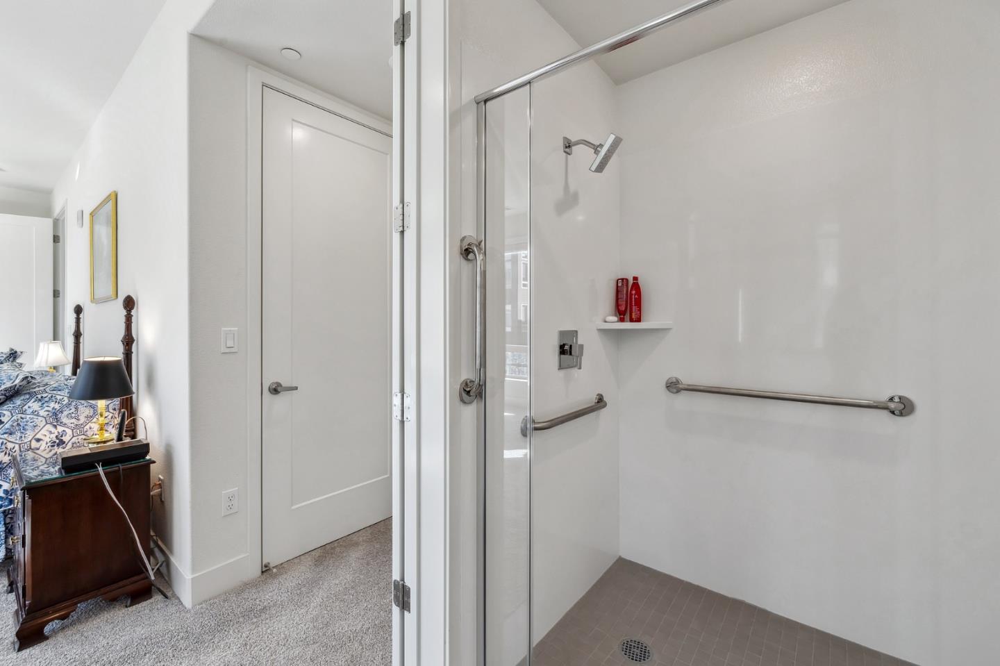 779 Eppleton Lane, Unit 304 Foster City, CA 94404 - Photo 24 of 34 a bathroom with a shower and a sink