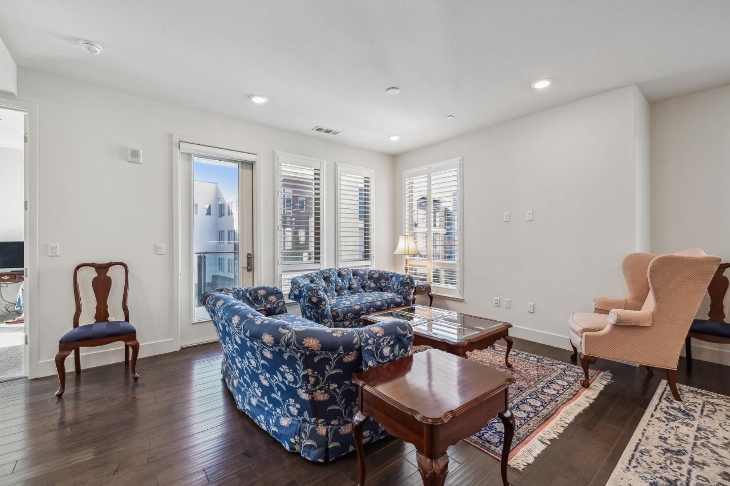 779 Eppleton Lane, Unit 304 Foster City, CA 94404 - Photo 7 of 34 a living room with furniture and wooden floor