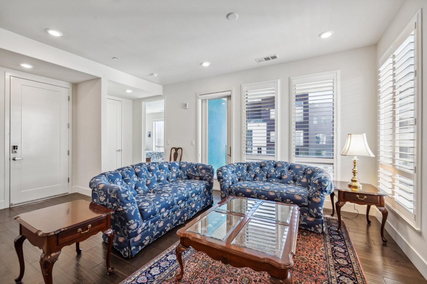 779 Eppleton Lane, Unit 304 Foster City, CA 94404 - Photo 8 of 34 a living room with furniture and a window