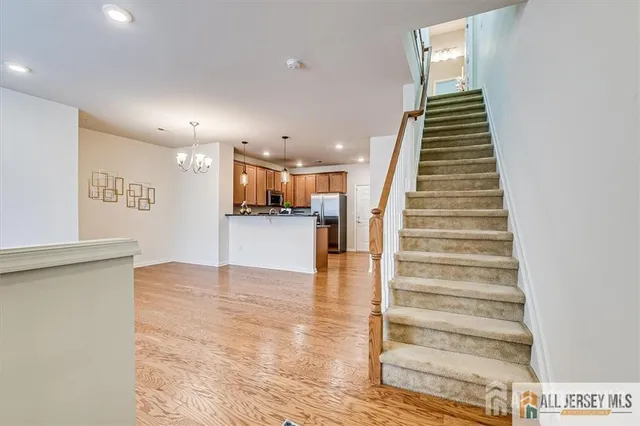 front view of a brick building with a yard