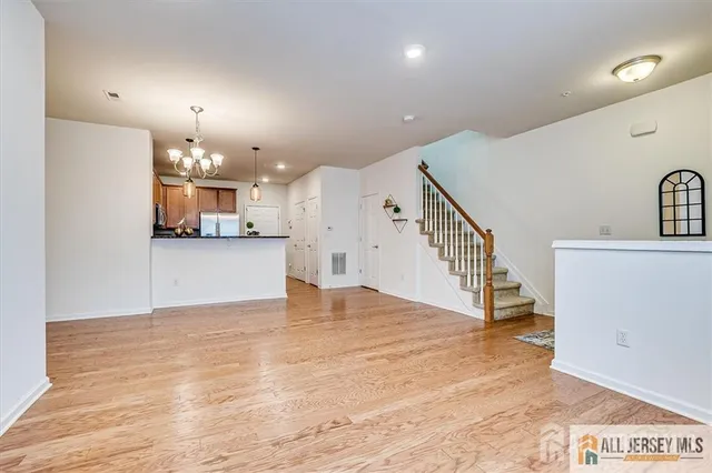 view of room with window and wooden floor