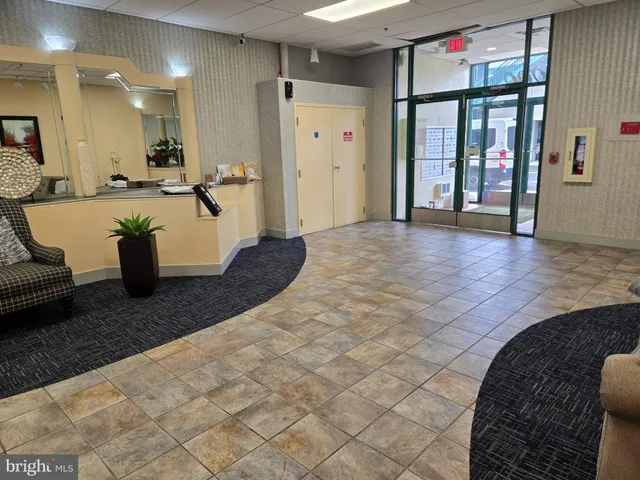 a view of a living room and entry way