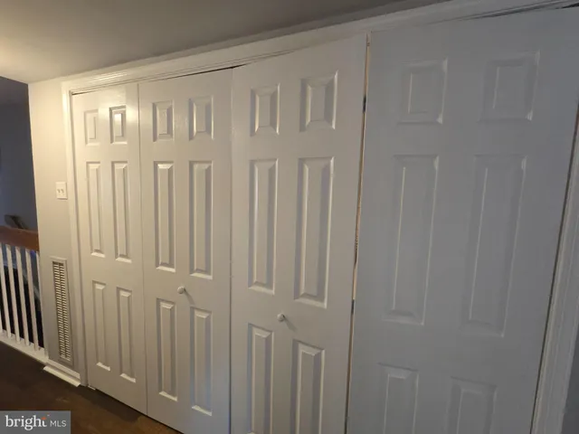 a view of a porch with wooden door