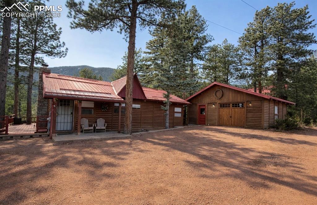 a house with trees in front of it