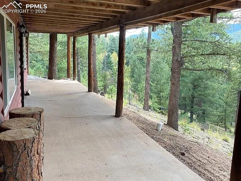 121 St Charles Drive Rye, CO 81069 - Photo 20 of 21 a view of a house with backyard and balcony