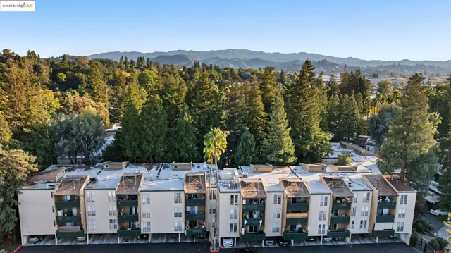 a couple of table and chairs in front of a building