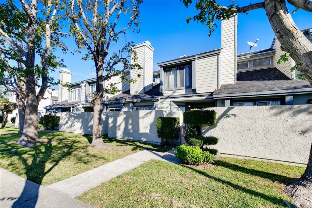 9013 Buckles Street Downey, CA 90241 - Photo 1 of 32 a view of a house with a yard