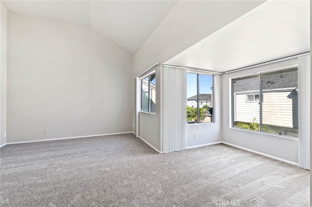 9013 Buckles Street Downey, CA 90241 - Photo 25 of 32 an empty room with windows