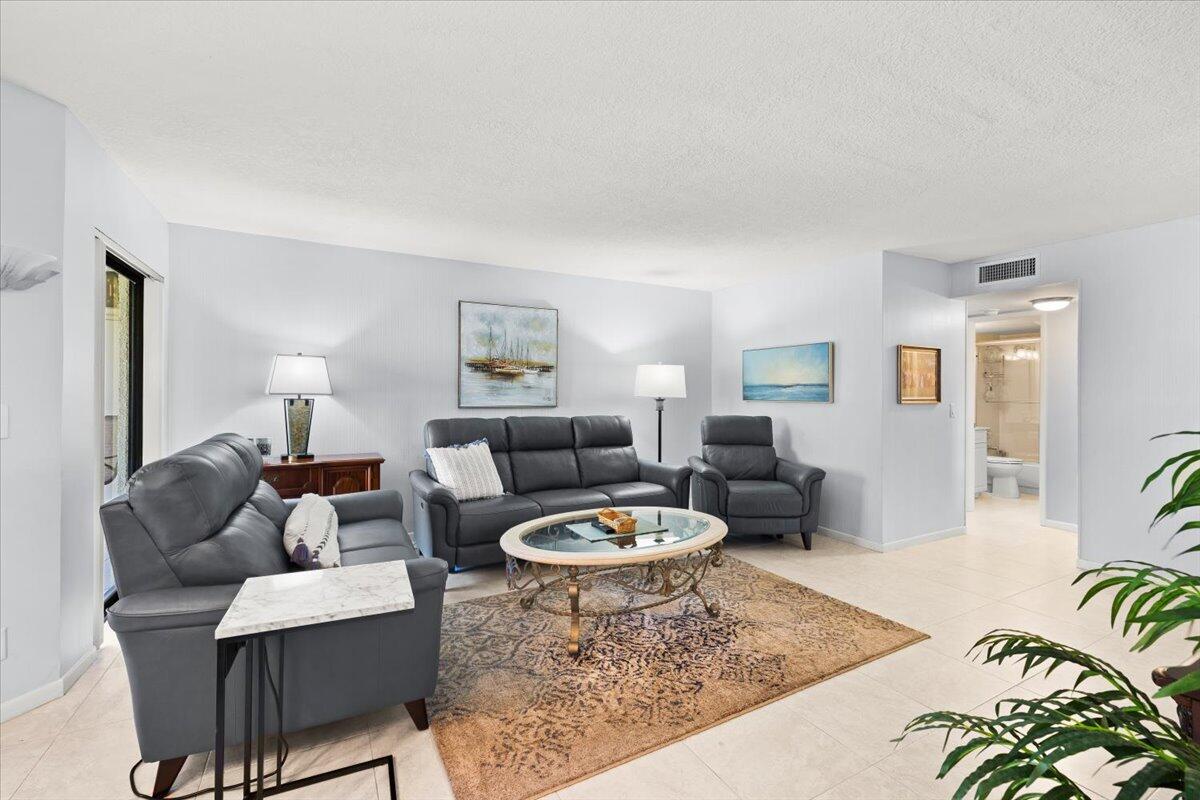 5851 Camino Del Sol, Unit 203 Boca Raton, FL 33433 - Photo 6 of 33 SPACIOUS LIVING ROOM