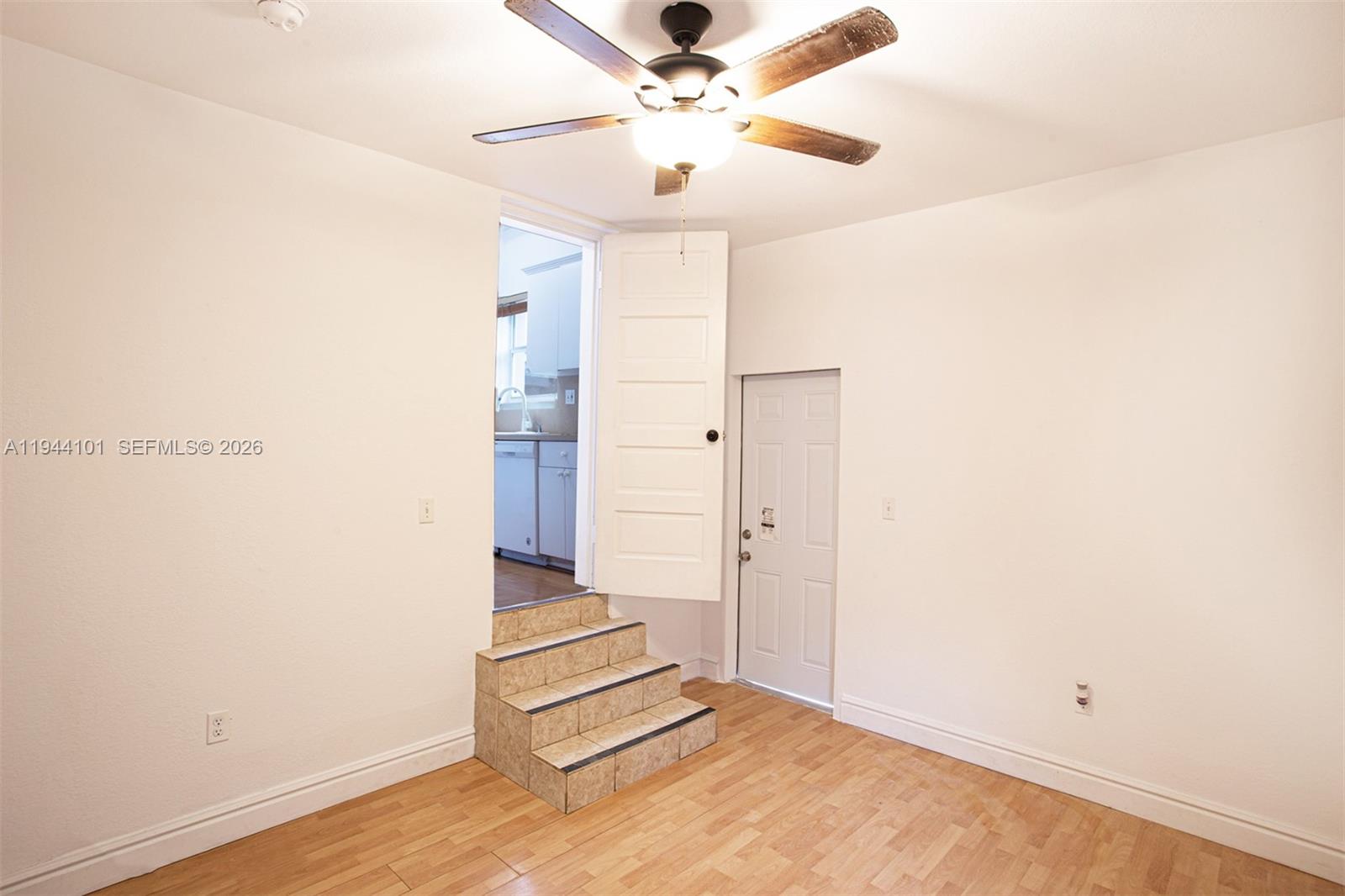 236 Southwest 28th Road Miami, FL 33129 - Photo 14 of 32 a view of an entryway with wooden floor