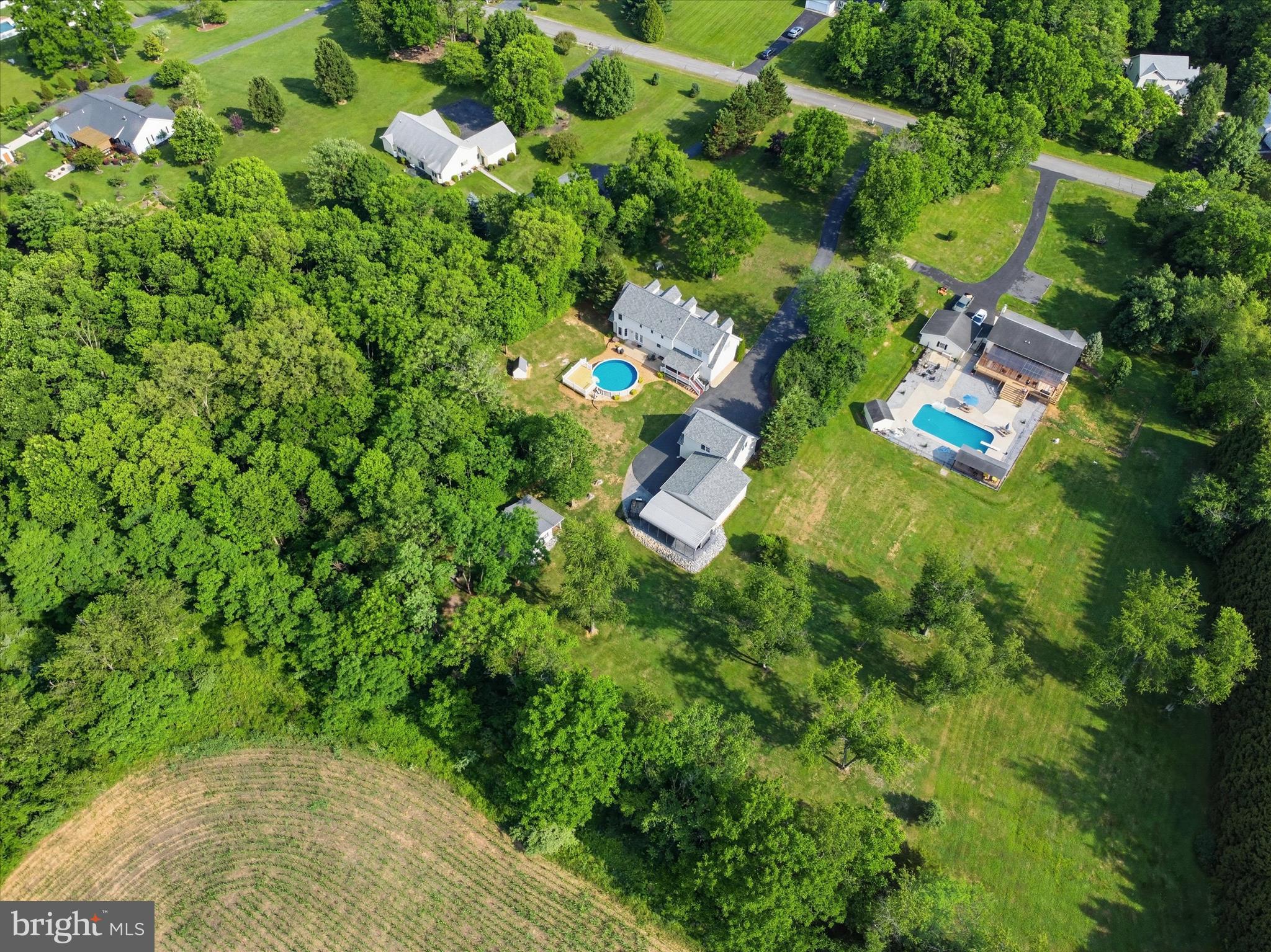 726 Doe Run Road Inwood, WV 25428 - Photo 65 of 68 an aerial view of residential house with swimming pool and outdoor space