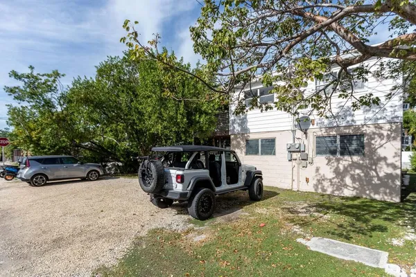 a view of a car in front of house