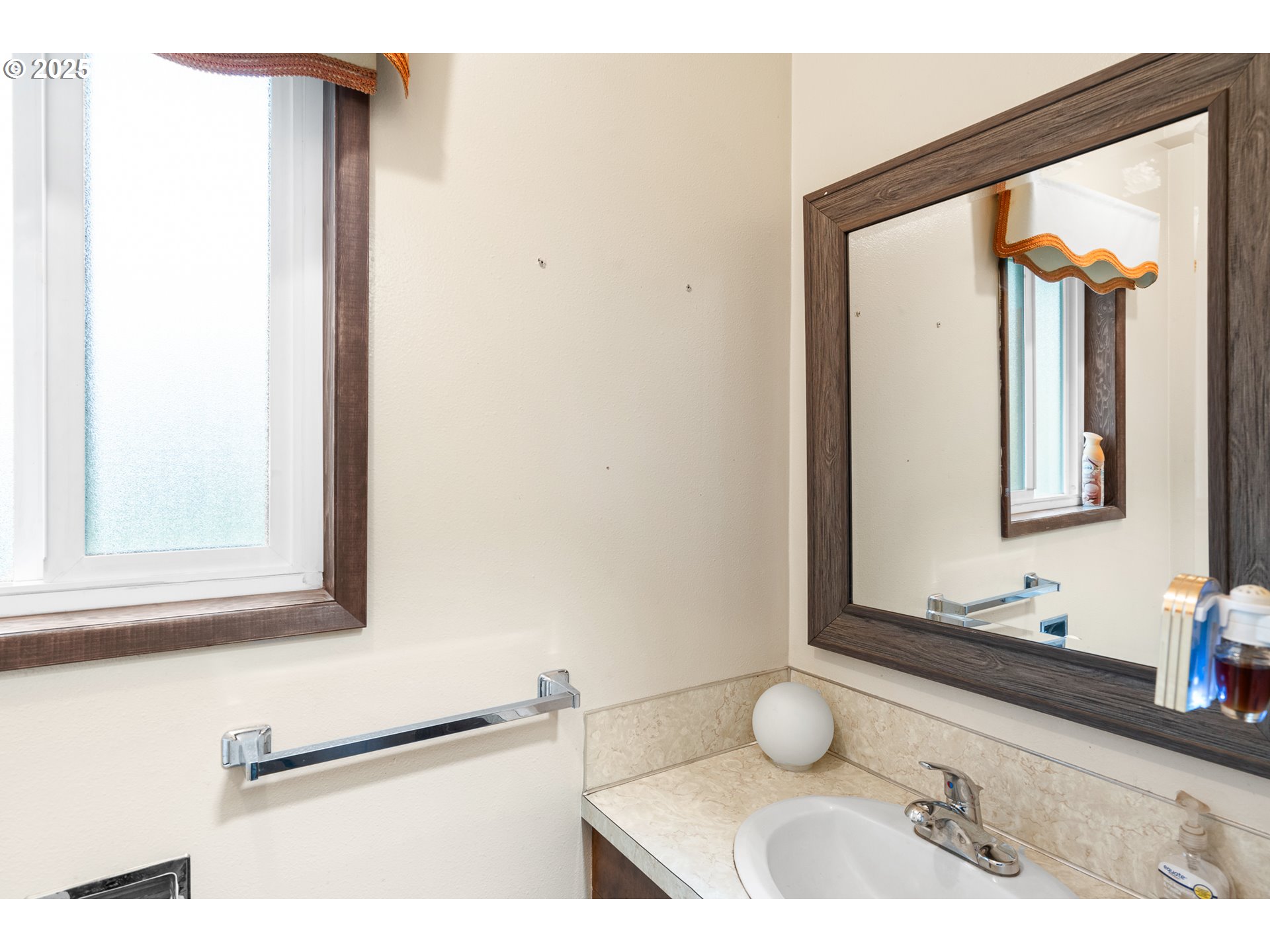 319 Monitor Road Silverton, OR 97381 - Photo 27 of 32 a bathroom with a mirror and a sink
