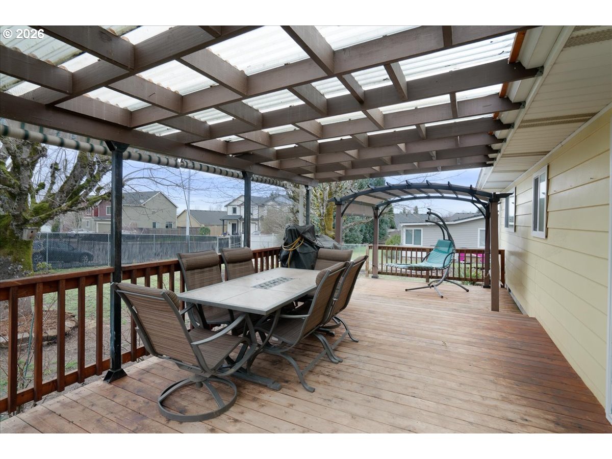 319 Monitor Road Silverton, OR 97381 - Photo 30 of 32 a view of a porch with furniture and wooden floor