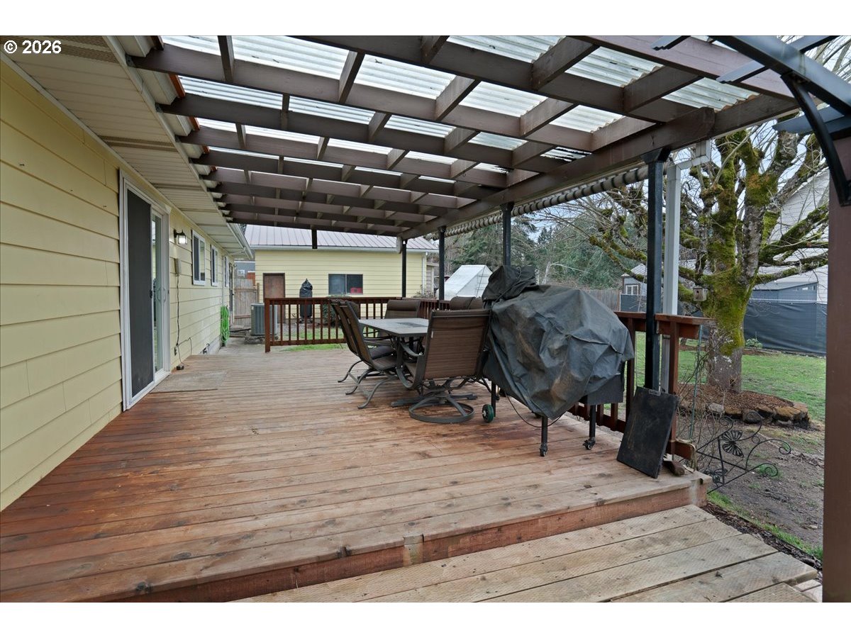 319 Monitor Road Silverton, OR 97381 - Photo 31 of 32 a view of a patio with table and chairs