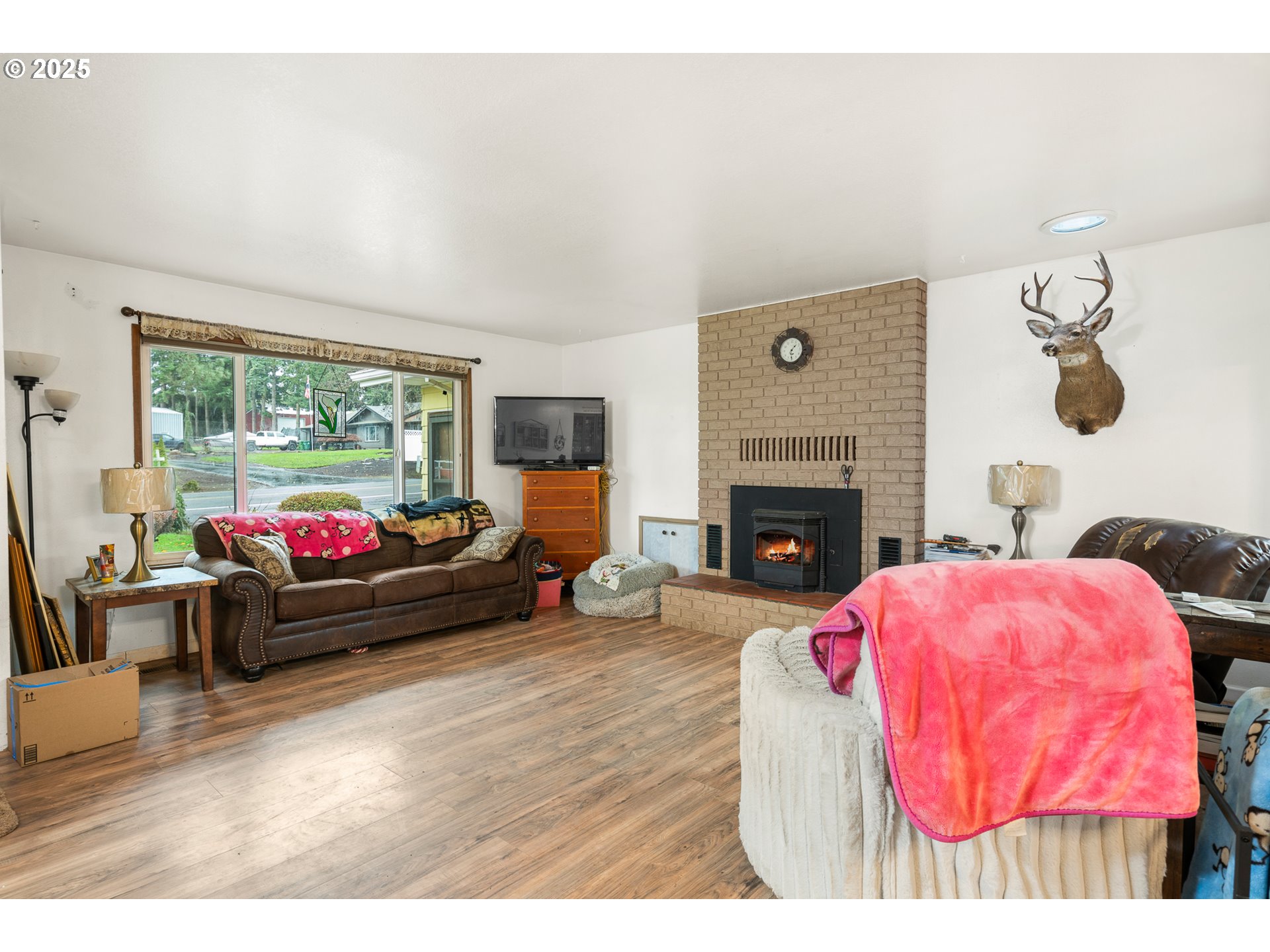 319 Monitor Road Silverton, OR 97381 - Photo 6 of 32 a living room with furniture and a fireplace