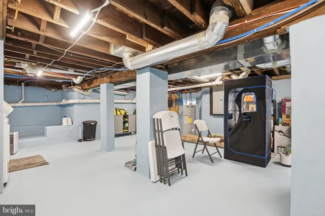 a view of a patio with iron fence