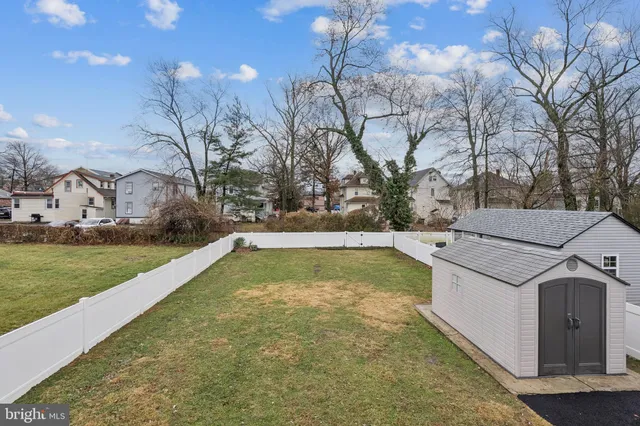 a swimming pool view with a outdoor seating