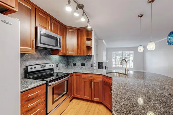 a bathroom with a sink and mirror