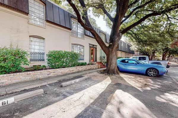 a car parked in front of a house