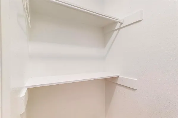 a view of balcony with furniture