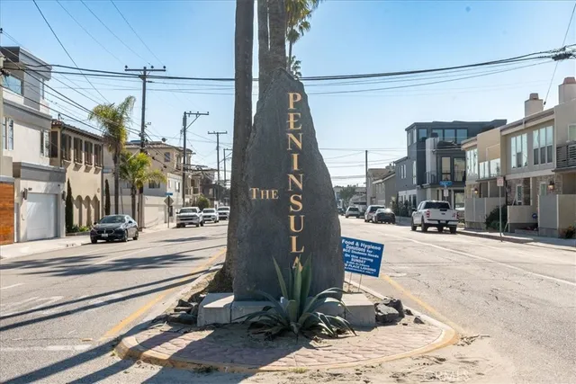 a view of a lake with boats and trees in the background