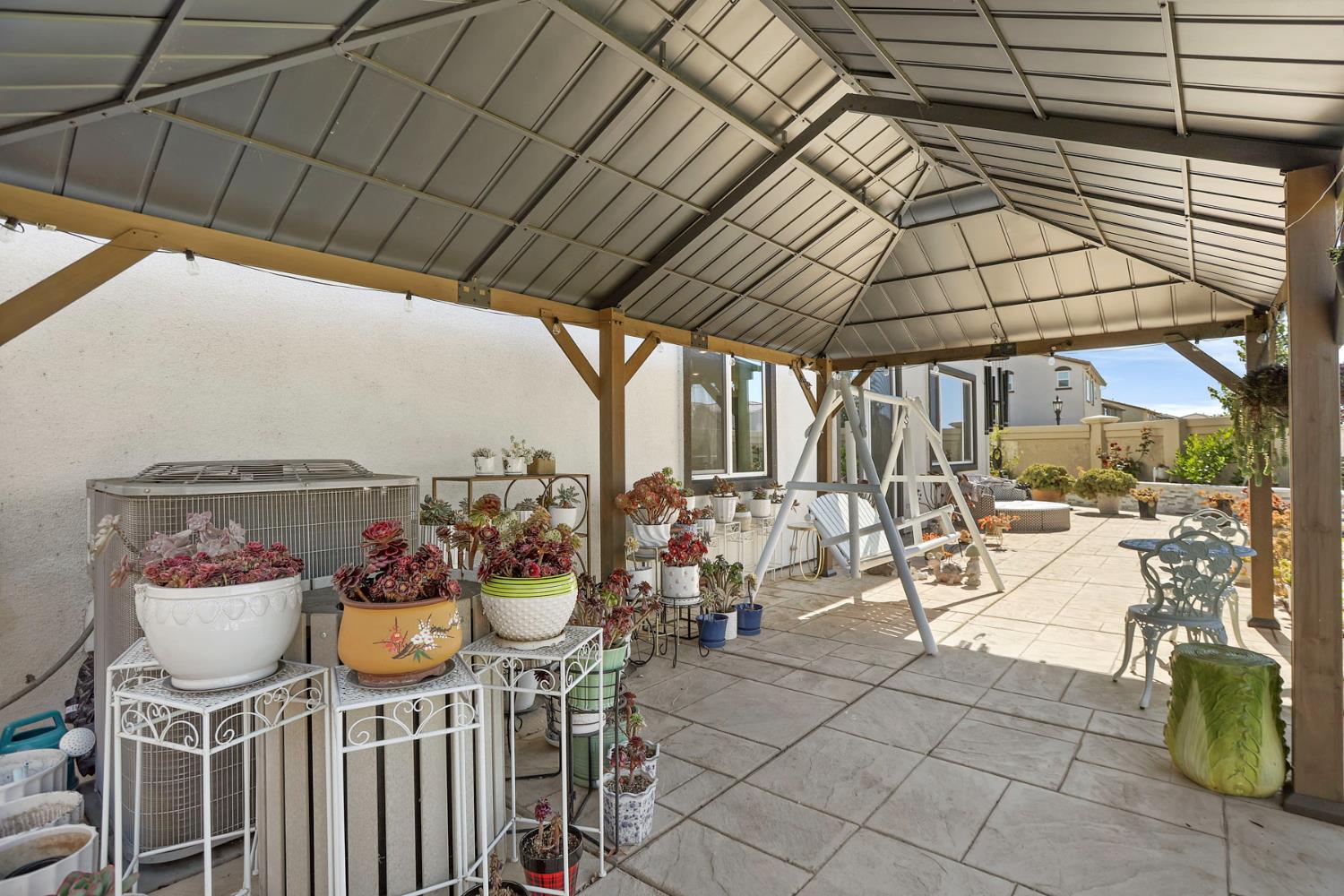 6949 Foraker Drive Stockton, CA 95219 - Photo 32 of 34 a view of a chairs and table in patio