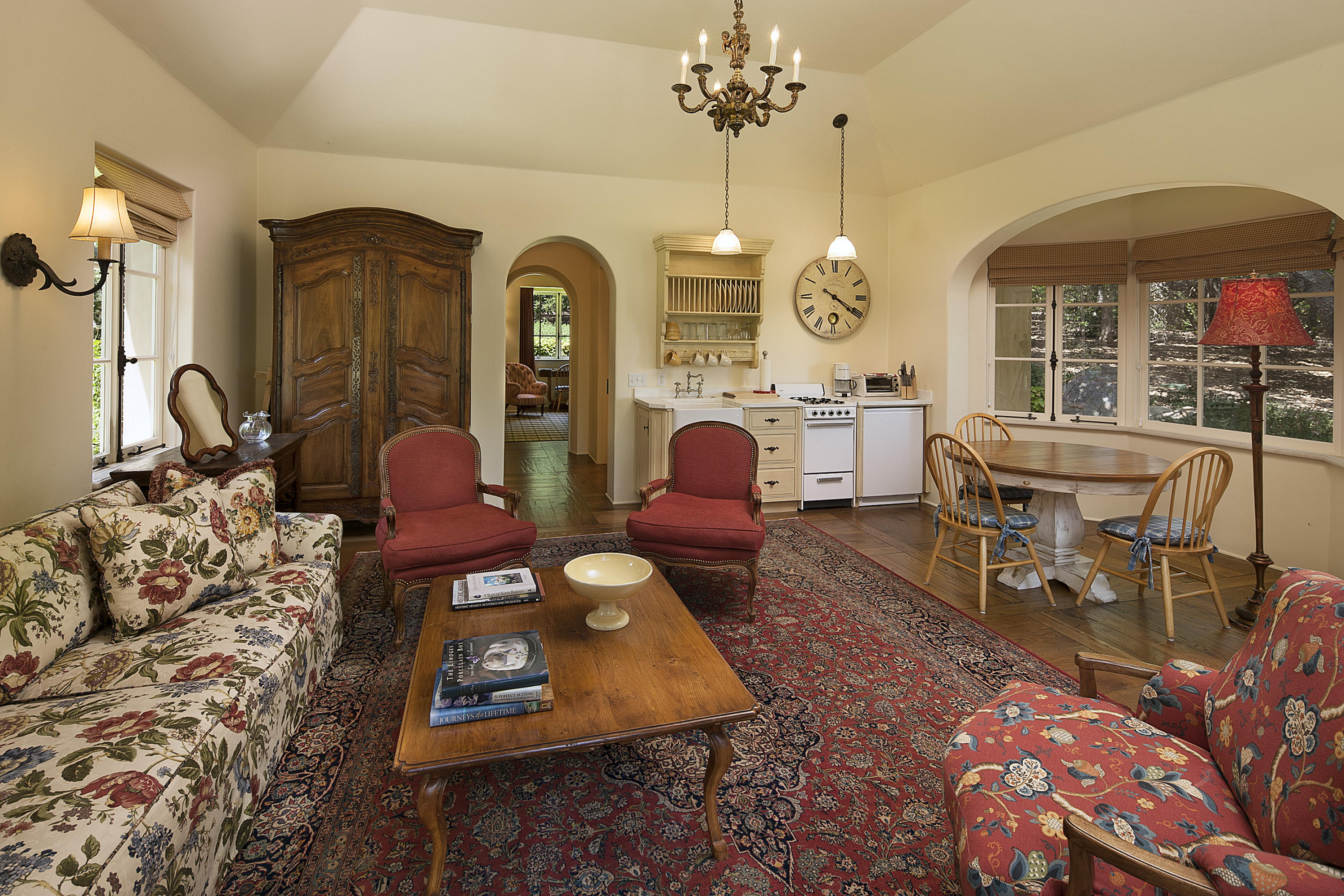 690 Picacho Lane Montecito, CA 93108 - Photo 17 of 22 a living room with furniture a chandelier and a rug