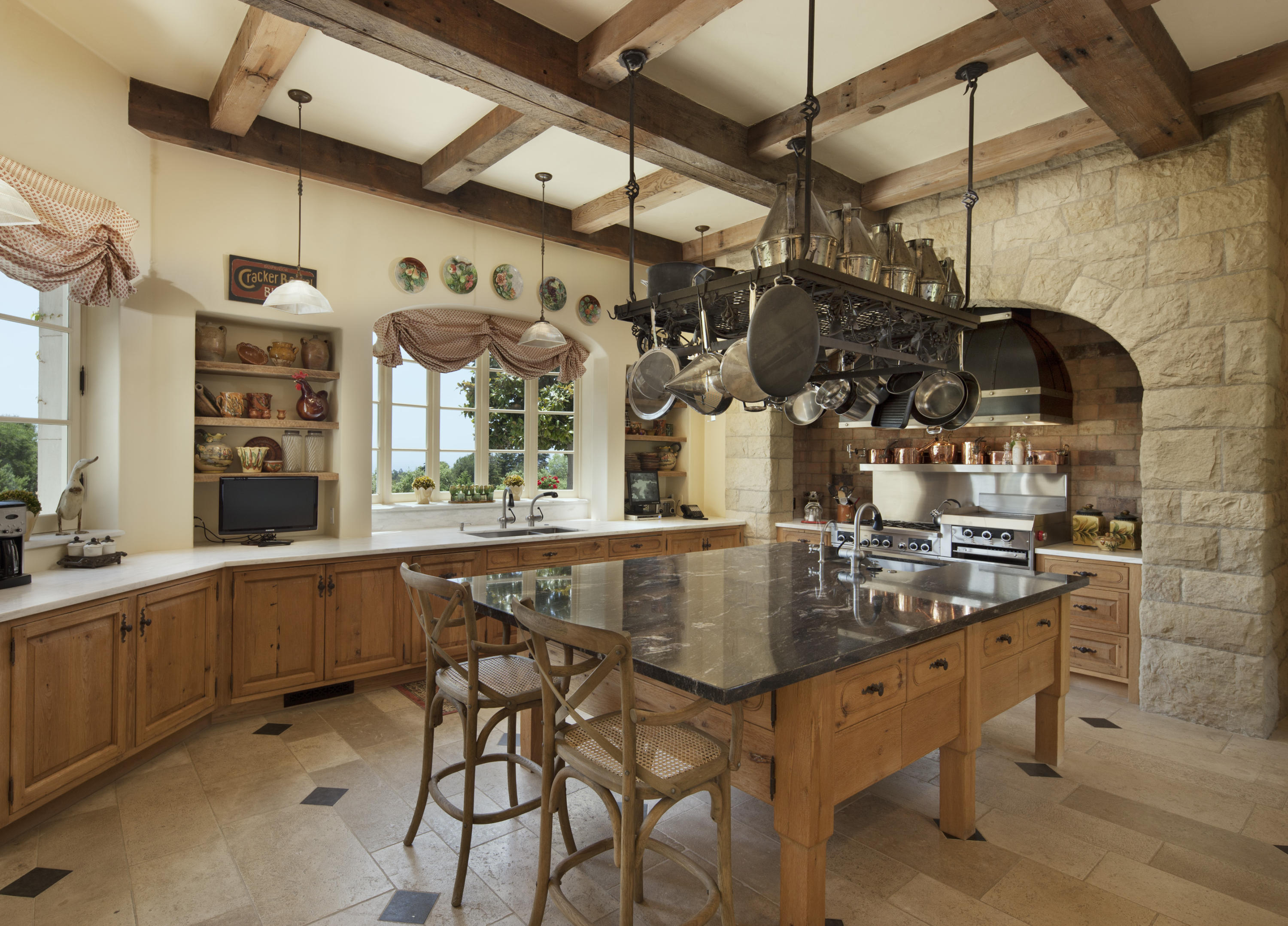 690 Picacho Lane Montecito, CA 93108 - Photo 9 of 22 a kitchen with stainless steel appliances granite countertop a sink and cabinets